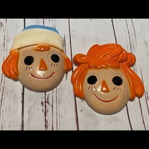 Vintage raggedy and and Andy painted chalkware wall plaques